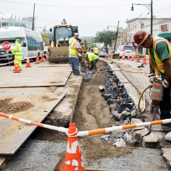 JULIUS CONSTANTINE MOTAL
A repair worker uses a jackhammer on asphalt on Riverdale Avenue between West 256th and West 259th streets. The work creates a bottleneck along the avenue that slows traffic significantly.